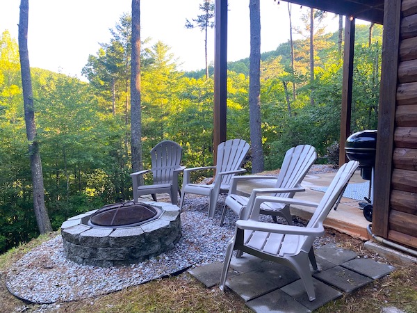 the fire pit at our Cherry Log cabin rental
